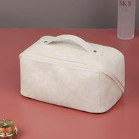 Floral embossed make-up bag