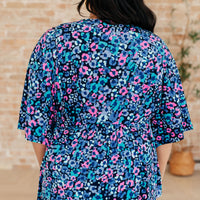 Dreamer Peplum Top in Navy and Lavender Animal Print