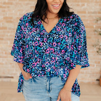 Dreamer Peplum Top in Navy and Lavender Animal Print