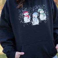 Snowmen Friends Graphic Hoodie in Black