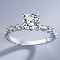 Classic 4-Prong Moissanite Ring